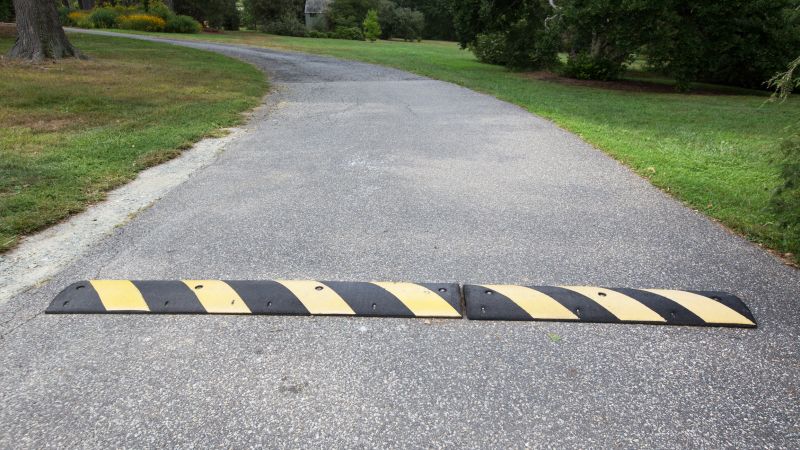 Asphalt Driveway Speed Bump Installation