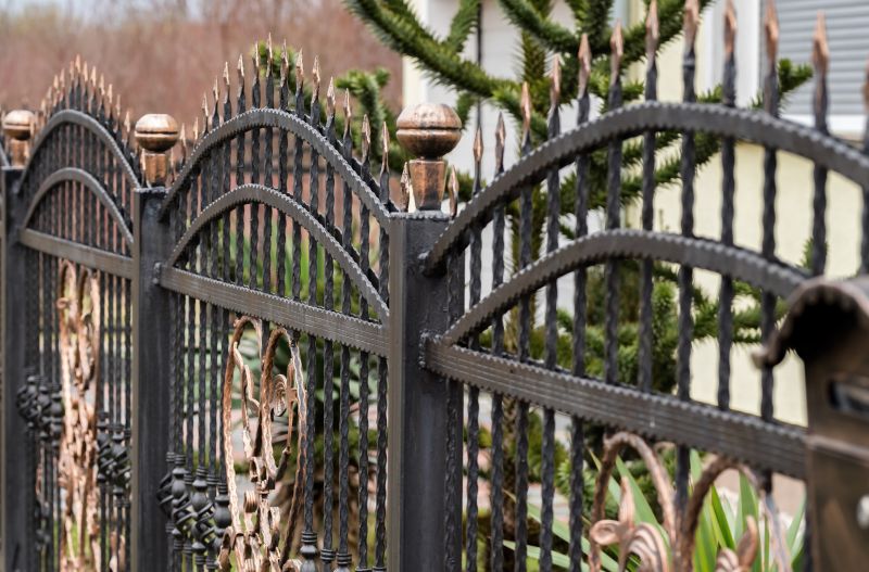 Scalloped Iron Fence Installation